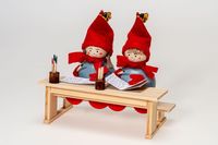 Tonttu Bertta and Tonttu Viho are sitting at the school desk